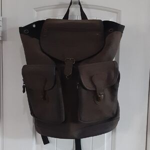 American Eagle Outfitters Brown Backpack with Front Pockets. Saddle Bag Styled.